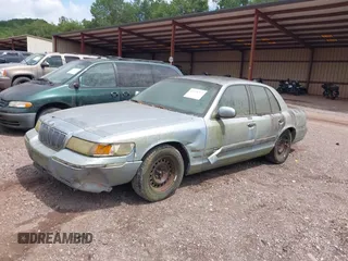 1999 Mercury Grand Marquis GS z VIN 2MEFM74W8XX686921, wystawiony jako IAAI lot #42374777 z przebiegiem 185 166 mil mil oraz . Historia ofert i sprzedaży dostępna na DreamBid. Obrazek 6.
