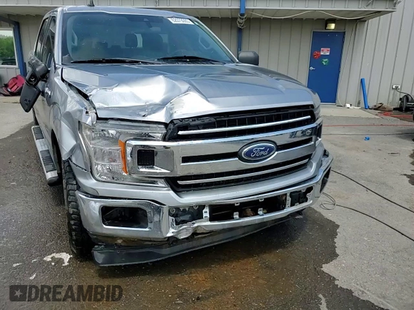 2020 Ford F-150 XL with VIN 1FTEW1E4XLFA98400, listed as a Copart auction lot 62073085 with 65,682 mi miles and Salvage title. Bid and sale history available at DreamBid. Image 13.