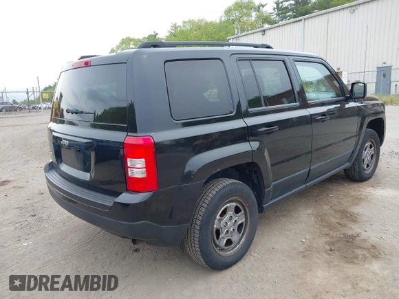 2014 Jeep Patriot Sport with VIN 1C4NJRBB3ED879757, listed as a IAAI auction lot 42241511 with 126,135 mi miles and . Bid and sale history available at carsss.com. Image 4.