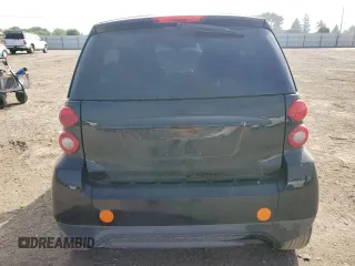 2014 Smart fortwo Pure z VIN WMEEJ3BA1EK753320, wystawiony jako Copart lot #55665555 z przebiegiem 71 305 mil mil oraz Szkody całkowita. Historia ofert i sprzedaży dostępna na DreamBid. Obrazek 6.