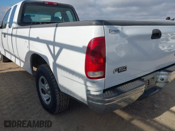 2002 Ford F-150 XL with VIN 1FTRX17W82NB78988, listed as a IAAI auction lot 41490173 with 1 mi miles. Bid and sale history available at carsss.com. Image 6.