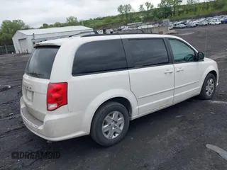2011 Dodge Grand Caravan SXT with VIN 2D4RN4DGXBR633009, listed as a IAAI auction lot 42177861 with 119,901 mi miles and . Bid and sale history available at DreamBid. Image 4.