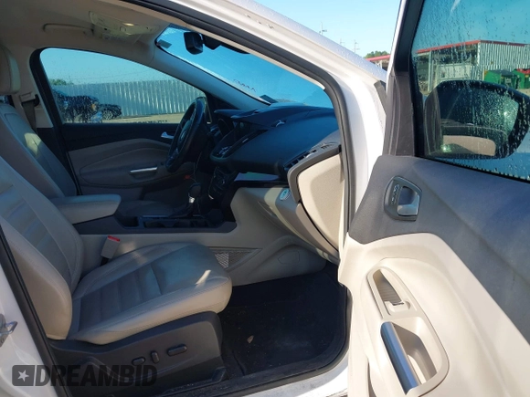 2017 Ford Escape Titanium with VIN 1FMCU0J90HUC51244, listed as a IAAI auction lot 42206165 with 106,847 mi miles and . Bid and sale history available at DreamBid. Image 5.