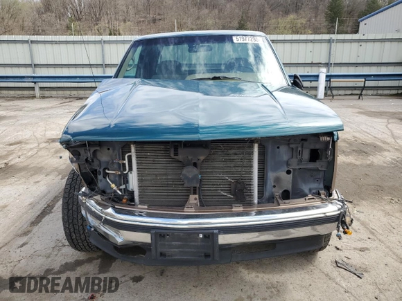 1995 GMC Sierra 1500 z VIN 2GTEK19K3S1511767, wystawiony jako Copart lot #51977295 z przebiegiem 215 667 mil mil oraz Szkody całkowita. Historia ofert i sprzedaży dostępna na DreamBid. Obrazek 5.