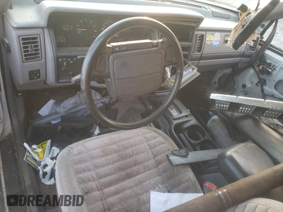 1993 Jeep Grand Cherokee Laredo with VIN 1J4GZ58Y9PC677532, listed as a Copart auction lot 44391245 with 178,772 mi miles and Salvage Title. Bid and sale history available at carsss.com. Image 8.