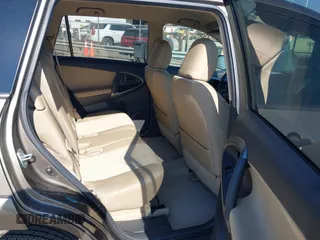 2009 Toyota RAV4 with VIN JTMZF33V395009905, listed as a IAAI auction lot 41881121 with 117,584 mi miles. Bid and sale history available at carsss.com. Image 8.