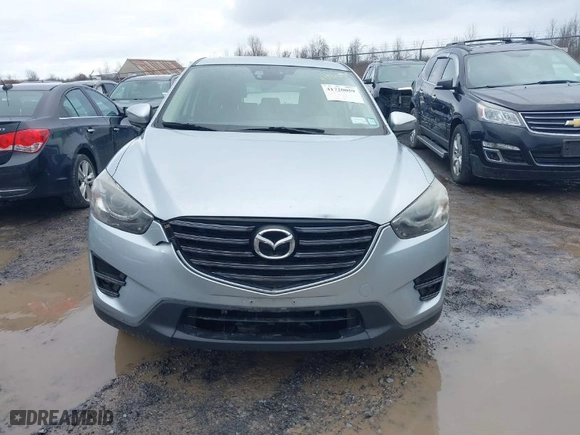 2016 Mazda CX-5 Grand Touring with VIN JM3KE4DY0G0816466, listed as a IAAI auction lot 41720059 with NaN miles. Bid and sale history available at carsss.com. Image 12.