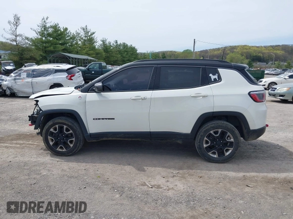 2017 Jeep Compass Trailhawk with VIN 3C4NJDDBXHT500588, listed as a IAAI auction lot 42060556 with 76,788 mi miles and . Bid and sale history available at DreamBid. Image 15.