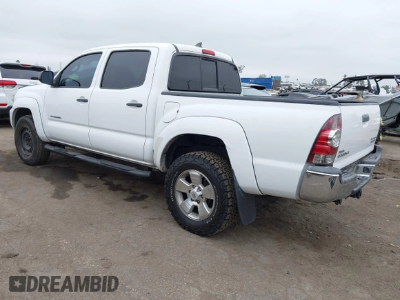 2014 Toyota Tacoma PreRunner with VIN 3TMJU4GNXEM172008, listed as a IAAI auction lot 42427701 with 164,987 mi miles and . Bid and sale history available at DreamBid. Image 3.