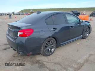 2016 Subaru WRX Premium with VIN JF1VA1E6XG9806929, listed as a IAAI auction lot 41567283 with 142,327 mi miles. Bid and sale history available at carsss.com. Image 4.