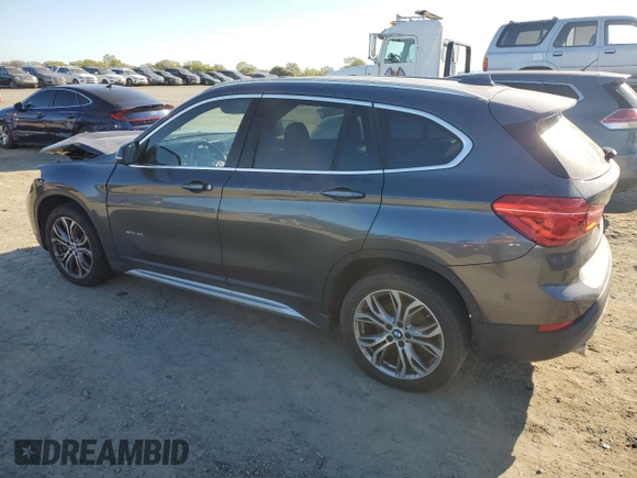 2017 BMW X1 sDrive28i with VIN WBXHU7C3XH5H36874, listed as a Copart auction lot 50607235 with 100,458 mi miles and Clean Title. Bid and sale history available at carsss.com. Image 2.