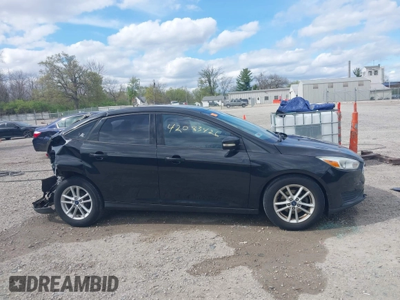 2015 Ford Focus SE with VIN 1FADP3F2XFL313187, listed as a IAAI auction lot 42083426 with 96,562 mi miles and . Bid and sale history available at carsss.com. Image 14.
