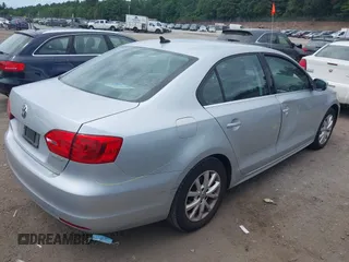 2013 Volkswagen Jetta SE with VIN 3VWDP7AJ6DM360709, listed as a IAAI auction lot 42656414 with 74,322 mi miles and . Bid and sale history available at DreamBid. Image 4.