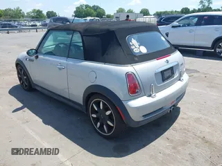 2008 MINI Convertible S with VIN WMWRH335X8TU80600, listed as a IAAI auction lot 42558412 with 105,970 mi miles and . Bid and sale history available at DreamBid. Image 3.
