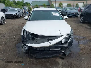 2018 Kia Optima S z VIN 5XXGT4L36JG233495, wystawiony jako IAAI lot #42284838 z przebiegiem 67 323 mil mil oraz . Historia ofert i sprzedaży dostępna na DreamBid. Obrazek 13.