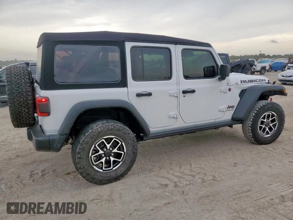 2024 Jeep Wrangler Rubicon with VIN 1C4PJXFG2RW266901, listed as a Copart auction lot 60641445 with 3,908 mi miles and Salvage title. Bid and sale history available at DreamBid. Image 3.