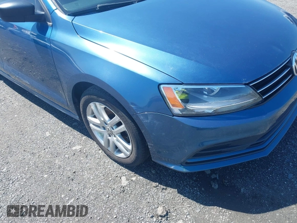 2015 Volkswagen Jetta Sedan 2.0L S with VIN 3VW2K7AJ9FM216984, listed as a IAAI auction lot 41980257 with 139,542 mi miles. Bid and sale history available at carsss.com. Image 6.