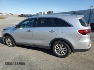 2019 Kia Sorento LX z VIN 5XYPG4A50KG463698, wystawiony jako Copart lot #50088435 z przebiegiem 68 787 mil mil oraz Szkoda całkowita • Salvage title. Historia ofert i sprzedaży dostępna na DreamBid. Obrazek 2.