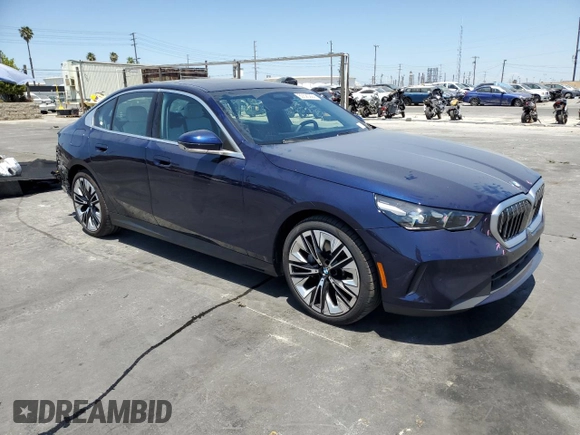 2024 BMW 5 Series 530i with VIN WBA43FJ06RCR00808, listed as a Copart auction lot 60520224 with 4,803 mi miles and Salvage Title. Bid and sale history available at carsss.com. Image 4.
