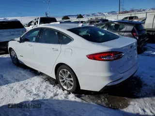 2019 Ford Fusion Hybrid SE with VIN 3FA6P0LU2KR216395, listed as a Copart auction lot 73071552 with 21,922 mi miles. Bid and sale history available at carsss.com. Image 2.