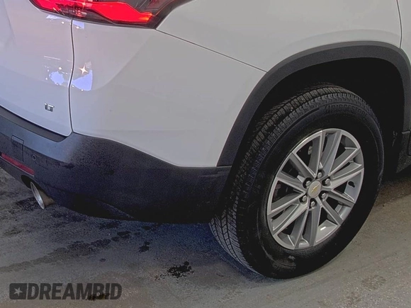2022 Chevrolet Traverse LT Cloth z VIN 1GNERGKW0NJ133033, wystawiony jako IAAI lot #42843495 z przebiegiem 97 178 mil mil oraz . Historia ofert i sprzedaży dostępna na DreamBid. Obrazek 2.