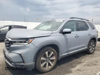 2023 Honda Pilot Touring with VIN 5FNYG2H74PB013082, listed as a Copart auction lot 59343835 with 45,723 mi miles and Salvage title. Bid and sale history available at DreamBid. Image 1.