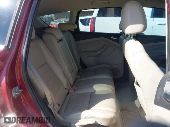 2014 Ford Escape Titanium with VIN 1FMCU0J91EUE12034, listed as a IAAI auction lot 42027493 with 160,417 mi miles and . Bid and sale history available at DreamBid. Image 8.