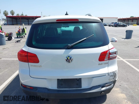 2014 Volkswagen Tiguan SEL with VIN WVGAV3AX9EW512956, listed as a IAAI auction lot 42110002 with 136,034 mi miles and . Bid and sale history available at DreamBid. Image 16.