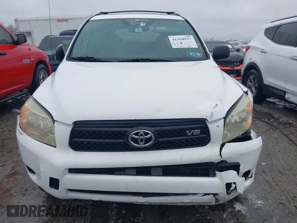 2007 Toyota RAV4 with VIN JTMBK33V976014286, listed as a IAAI auction lot 41568927 with 121,791 mi miles. Bid and sale history available at carsss.com. Image 12.
