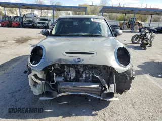 2019 MINI Hardtop 4 Door Cooper S z VIN WMWXU3C56K2H86566, wystawiony jako Copart lot #54783635 z przebiegiem 62 916 mil mil oraz Szkoda całkowita • Salvage title. Historia ofert i sprzedaży dostępna na DreamBid. Obrazek 5.