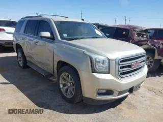 2015 GMC Yukon SLT with VIN 1GKS1BKC1FR145694, listed as a IAAI auction lot 41851644 with 162,592 mi miles. Bid and sale history available at carsss.com. Image 1.