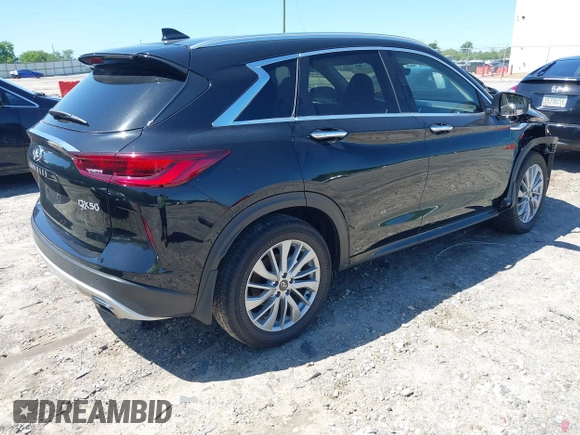 2023 Infiniti QX50 Luxe z VIN 3PCAJ5BA7PF116022, wystawiony jako IAAI lot #42321592 z przebiegiem 18 758 mil mil oraz . Historia ofert i sprzedaży dostępna na DreamBid. Obrazek 4.
