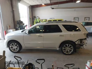 2016 Dodge Durango Citadel with VIN 1C4RDJEG9GC371805, listed as a IAAI auction lot 42135988 with 122,924 mi miles and . Bid and sale history available at DreamBid. Image 14.