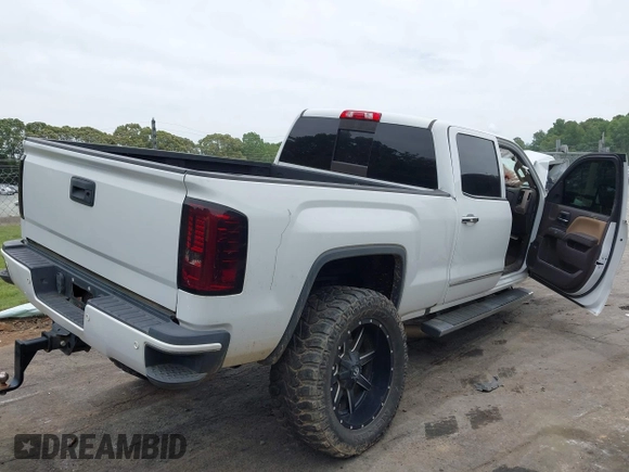 2017 GMC Sierra 2500HD Denali with VIN 1GT12UEG3HF117771, listed as a IAAI auction lot 42334696 with 140,999 mi miles and . Bid and sale history available at DreamBid. Image 4.