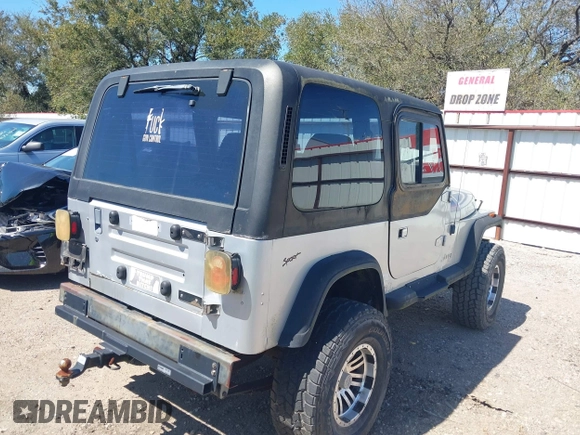 1994 Jeep Wrangler S with VIN 1J4FY19P9RP438376, listed as a IAAI auction lot 41751057 with 165,407 mi miles. Bid and sale history available at carsss.com. Image 4.