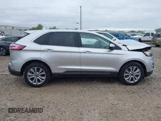 2019 Ford Edge Titanium with VIN 2FMPK4K99KBB56336, listed as a IAAI auction lot 42282600 with 52,422 mi miles and . Bid and sale history available at DreamBid. Image 14.