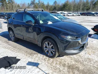 2022 Mazda CX-30 S Premium with VIN 3MVDMBDL1NM402893, listed as a IAAI auction lot 41406131 with 71,039 mi miles and . Bid and sale history available at carsss.com. Image 1.