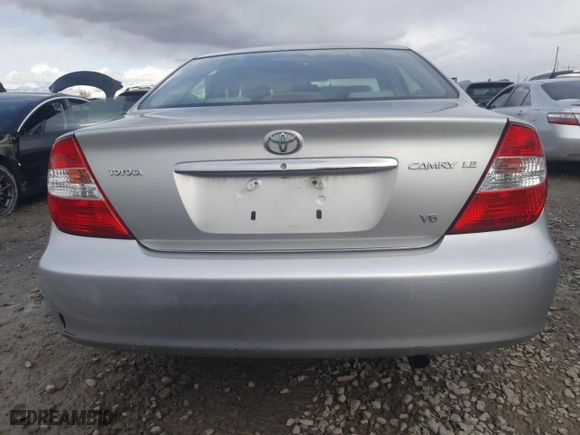 2004 Toyota Camry LE with VIN 4T1BF32K04U574924, listed as a Copart auction lot 48259895 with 134,239 mi miles and Salvage Title. Bid and sale history available at carsss.com. Image 6.