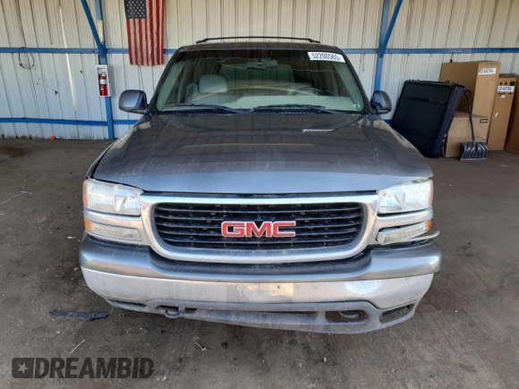 2001 GMC Yukon SLT z VIN 1GKEK13T21J165558, wystawiony jako Copart lot #52200565 z przebiegiem 291 699 mil mil oraz Szkoda całkowita • Salvage title. Historia ofert i sprzedaży dostępna na DreamBid. Obrazek 5.