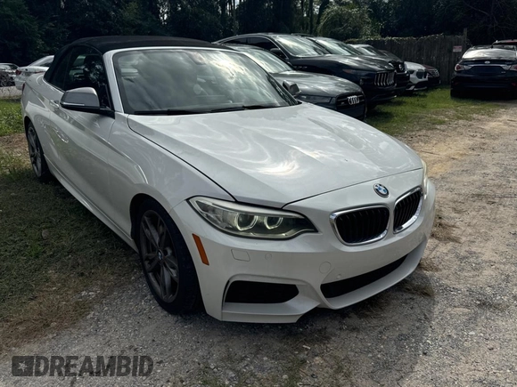 2015 BMW 2 Series M235i with VIN WBA1M1C56FV393758, listed as a Copart auction lot 81534244 with 51,015 mi miles and Salvage Title. Bid and sale history available at carsss.com. Image 1.