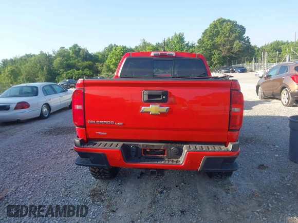 2020 Chevrolet Colorado 4WD Z71 with VIN 1GCGTDEN6L1215253, listed as a IAAI auction lot 42343032 with 61,632 mi miles and . Bid and sale history available at DreamBid. Image 16.
