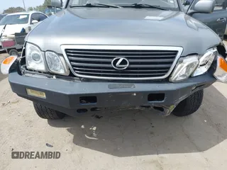 2001 Lexus LX 470 z VIN JTJHT00WX13509489, wystawiony jako IAAI lot #42227083 z przebiegiem 360 283 mil mil oraz . Historia ofert i sprzedaży dostępna na DreamBid. Obrazek 6.