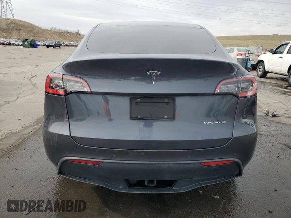 2021 Tesla Model Y Long Range with VIN 5YJYGDEE4MF076774, listed as a Copart auction lot 50566175 with 93,137 mi miles and Salvage Title. Bid and sale history available at carsss.com. Image 6.