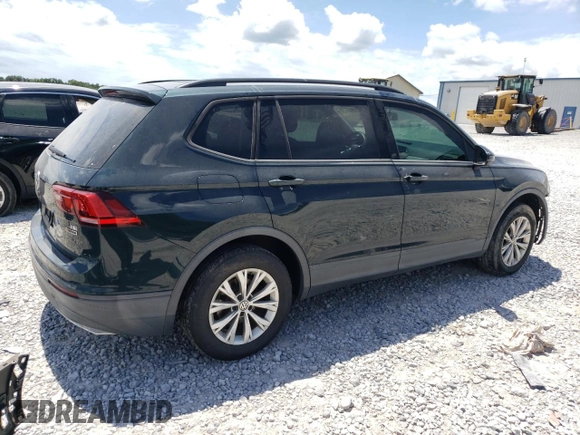 2018 Volkswagen Tiguan S with VIN 3VV0B7AX4JM042248, listed as a Copart auction lot 65202625 with 102,021 mi miles and Salvage title. Bid and sale history available at DreamBid. Image 3.