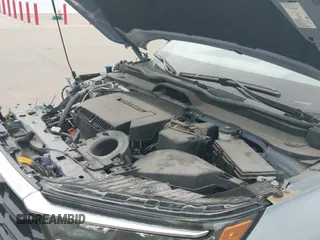 2023 Honda Pilot Elite with VIN 5FNYG1H82PB034130, listed as a IAAI auction lot 42791889 with 7,711 mi miles and . Bid and sale history available at DreamBid. Image 19.