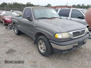 2000 Mazda B-Series Truck SX with VIN 4F4YR12C9YTM23599, listed as a IAAI auction lot 41393276 with 232,789 mi miles and . Bid and sale history available at DreamBid. Image 1.