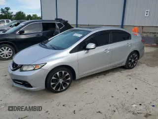 2013 Honda Civic Si with VIN 2HGFB6E59DH703448, listed as a Copart auction lot 56529815 with 157,790 mi miles and Salvage title. Bid and sale history available at DreamBid. Image 1.