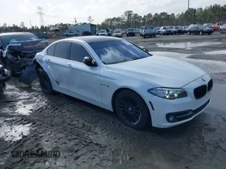2016 BMW 5 Series 528i with VIN WBA5A5C51GD527407, listed as a IAAI auction lot 41702267 with 110,526 mi miles. Bid and sale history available at carsss.com. Image 1.
