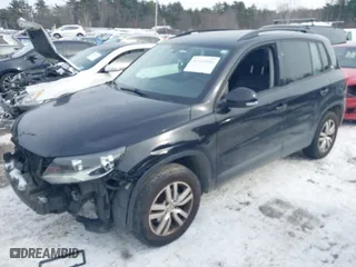 2016 Volkswagen Tiguan R-Line with VIN WVGAV7AX0GW598930, listed as a IAAI auction lot 41525554 with 142,248 mi miles. Bid and sale history available at carsss.com. Image 2.