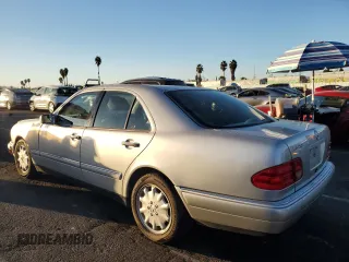 1999 Mercedes-Benz E-Class with VIN WDBJF65H8XA734585, listed as a Copart auction lot 79141194 with 196,908 mi miles and Salvage Title. Bid and sale history available at carsss.com. Image 2.